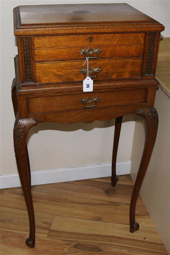 An oak cased part canteen of plated cutlery, on a single drawer stand, canteen 20in.